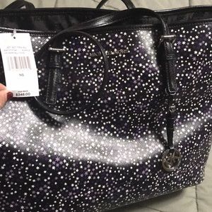 Michael Kors  new is $348 will sell for $250